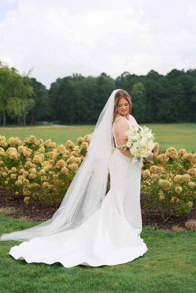 a beautiful bride holding her florals